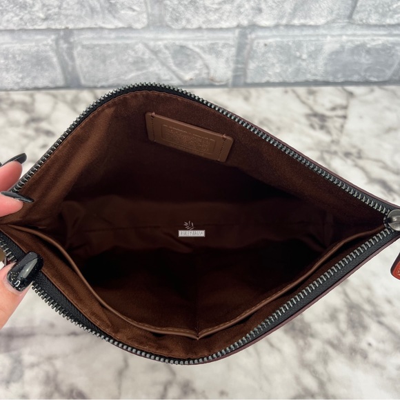 Coach X Peanuts Carry All Pouch In Signature Canvas With Snoopy Woodstock Print - Picture 9 of 11